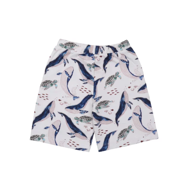 pantaloncini per bambini di colore bianco con stampe di balene e tartarughe marine